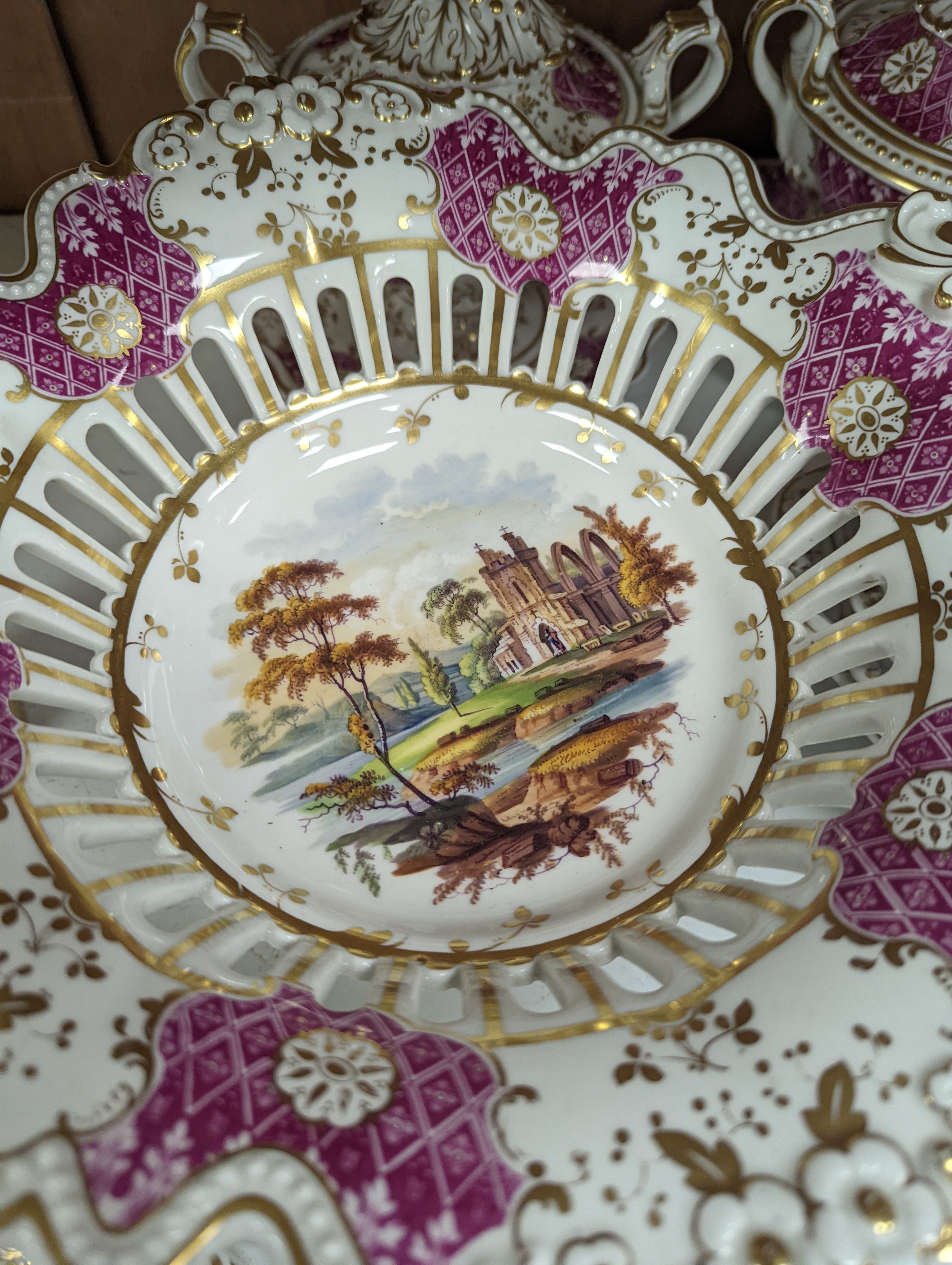 A Ridgways porcelain topographical part dessert service, c.1835, pattern number 2168, the sauce tureens and covers pattern number 2179